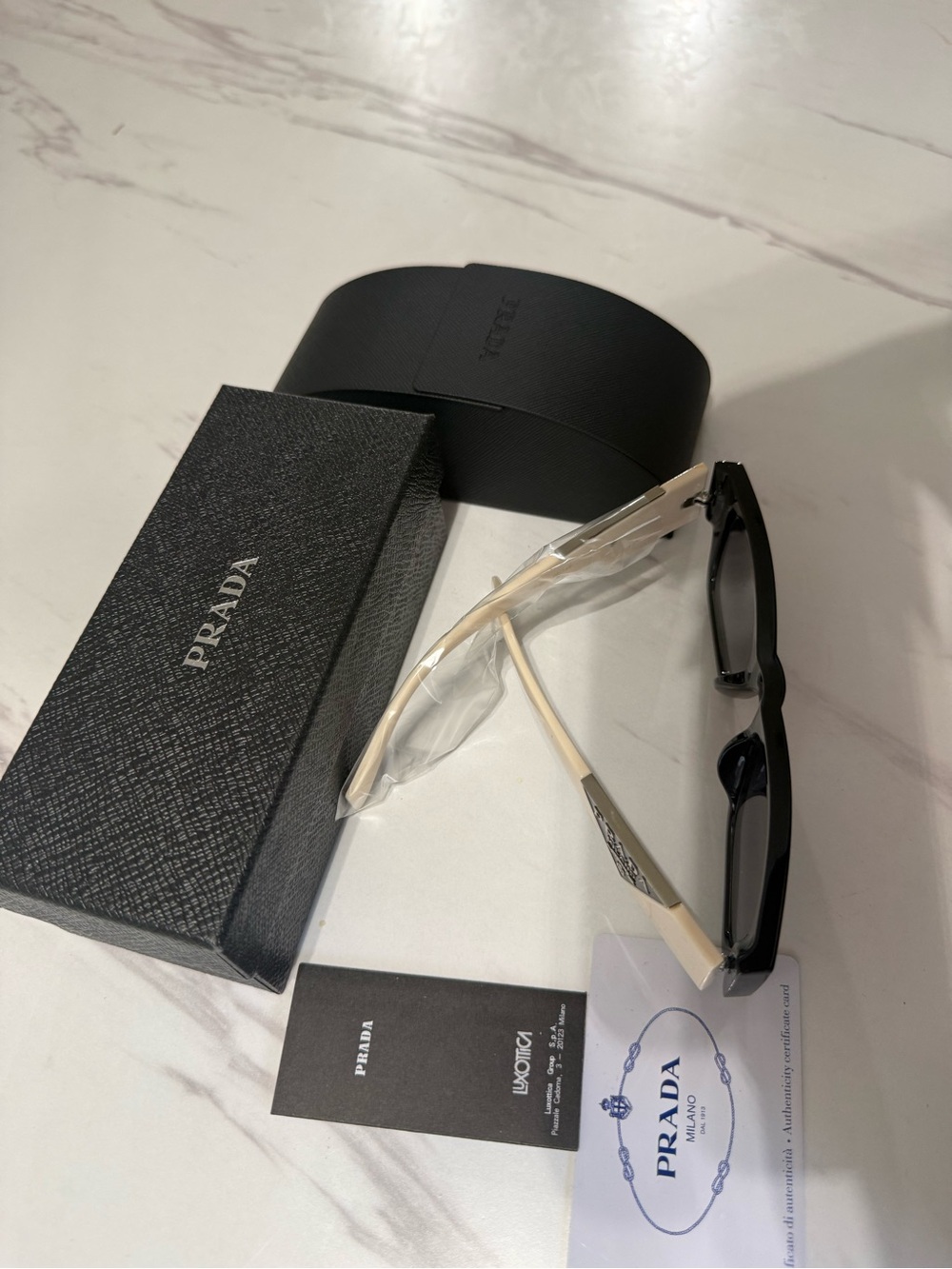 Prada Black Front Sunglasses with White Temples - Picture 6 of 6